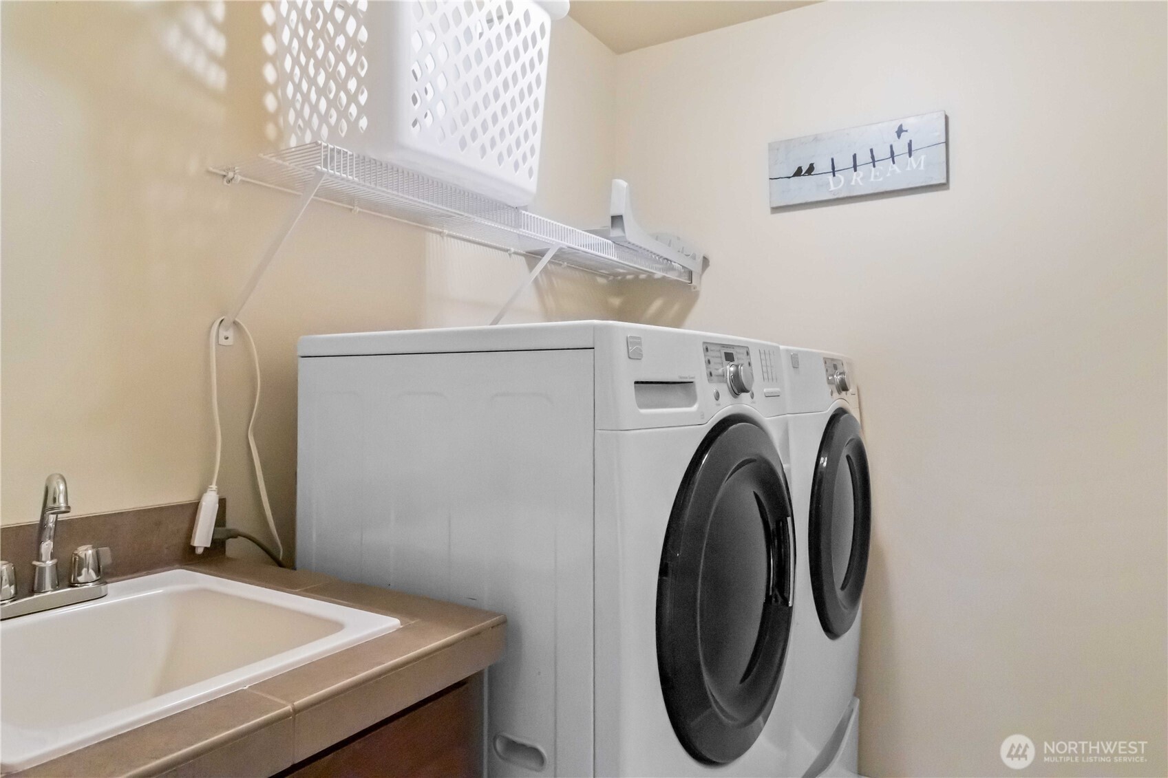 6721 Southeast 2nd Street Renton, WA 98059 - Photo 26 of 32 a utility room with dryer and washer