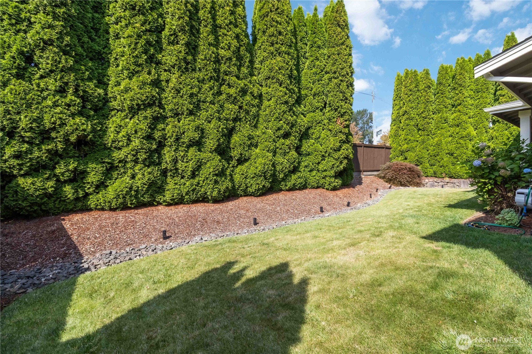 6721 Southeast 2nd Street Renton, WA 98059 - Photo 28 of 32 a view of a yard with plants