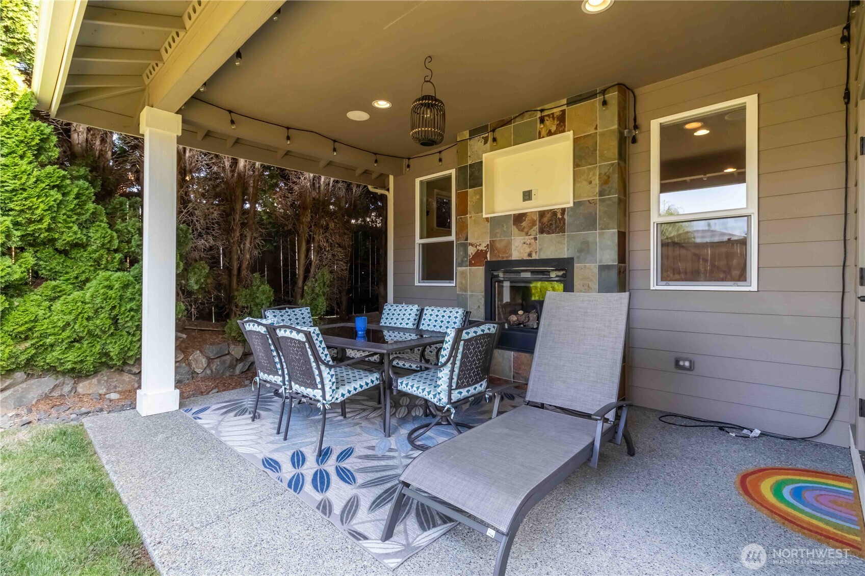 6721 Southeast 2nd Street Renton, WA 98059 - Photo 29 of 32 a view of a patio with table and chairs and potted plants