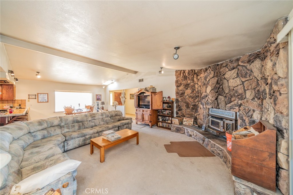 18080 Manitou Road Apple Valley, CA 92307 - Photo 14 of 43 a living room with furniture and a couch