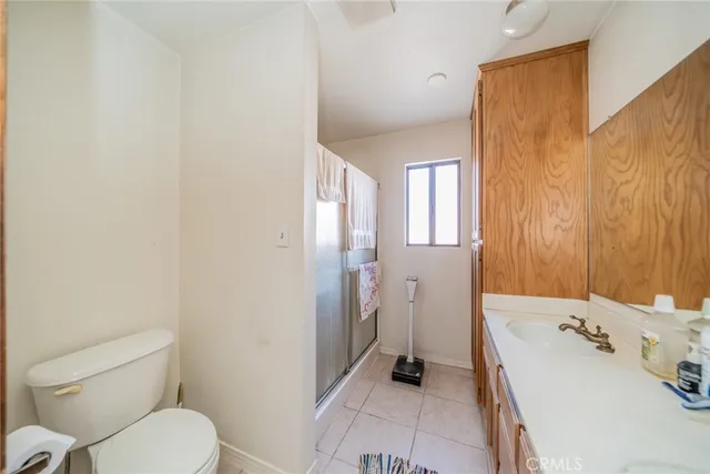a bathroom with a sink a toilet and a tub
