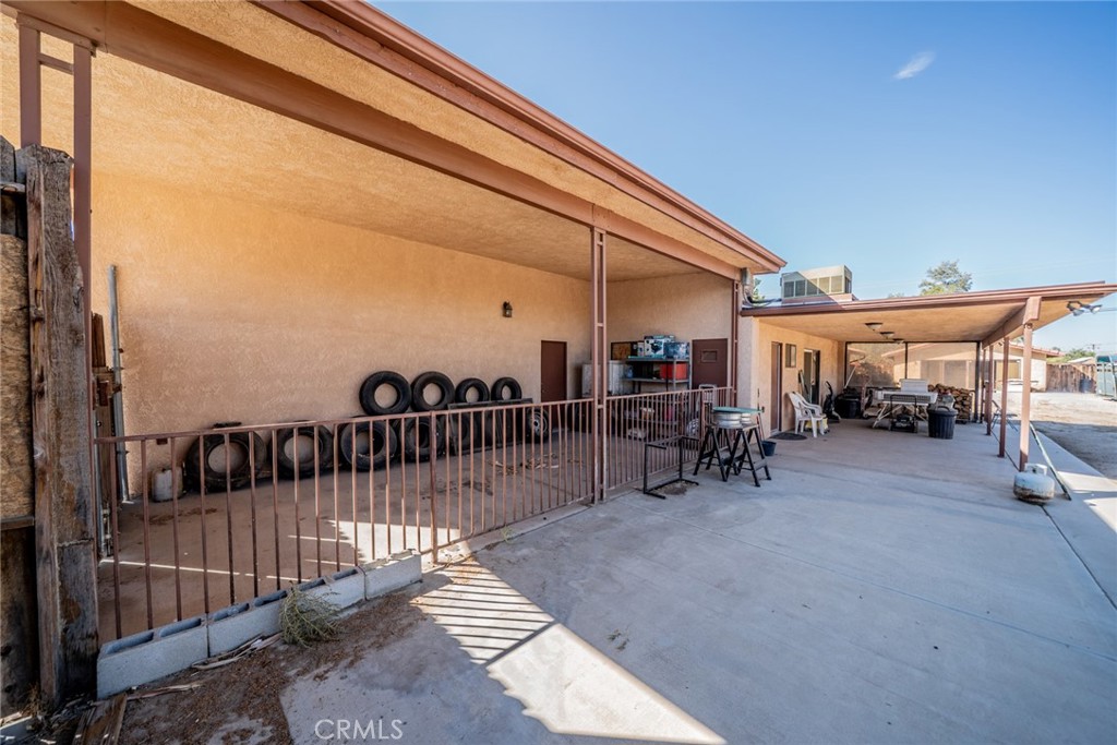 18080 Manitou Road Apple Valley, CA 92307 - Photo 38 of 43 a view of a porch with furniture