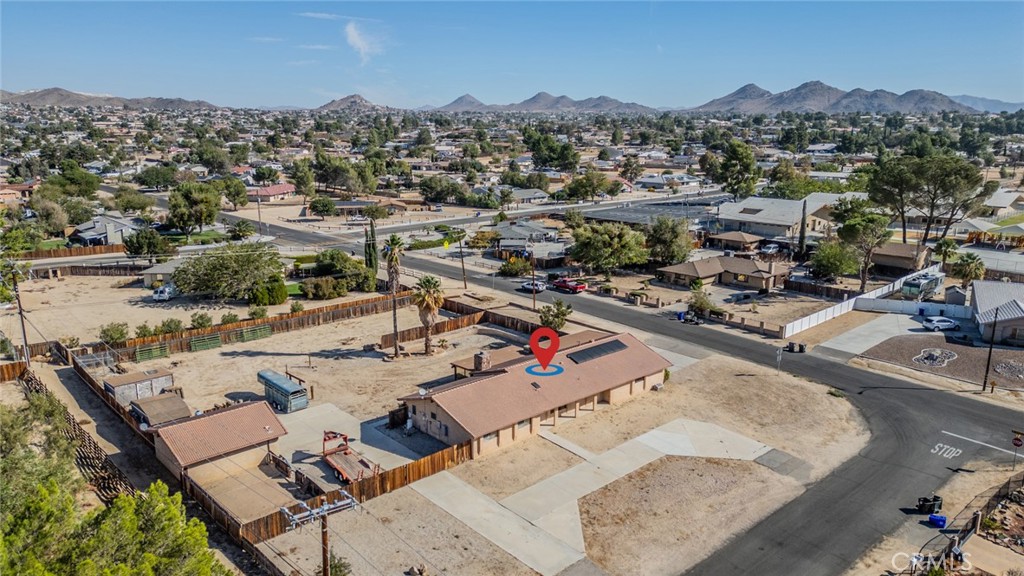 18080 Manitou Road Apple Valley, CA 92307 - Photo 40 of 43 an aerial view of residential houses with outdoor space