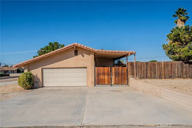 a view of a house with a garage
