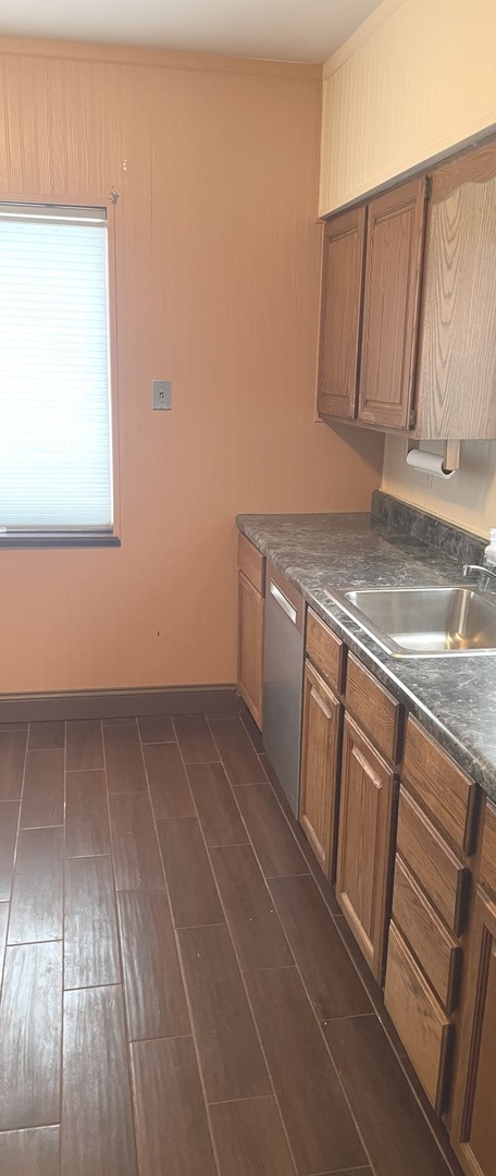 Undisclosed Address La Grange Park, IL 60526 - Photo 8 of 15 a view of kitchen with granite countertop cabinets and sink