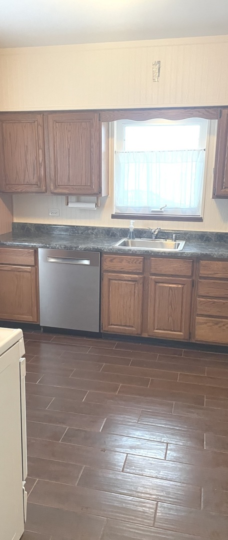 Undisclosed Address La Grange Park, IL 60526 - Photo 10 of 15 a kitchen with granite countertop a sink and a stove