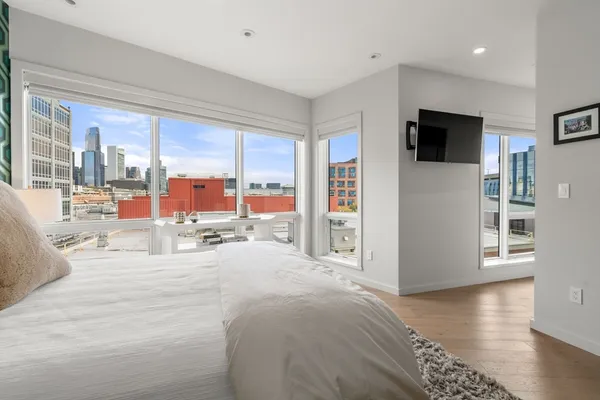 a view of a living room and a flat screen tv