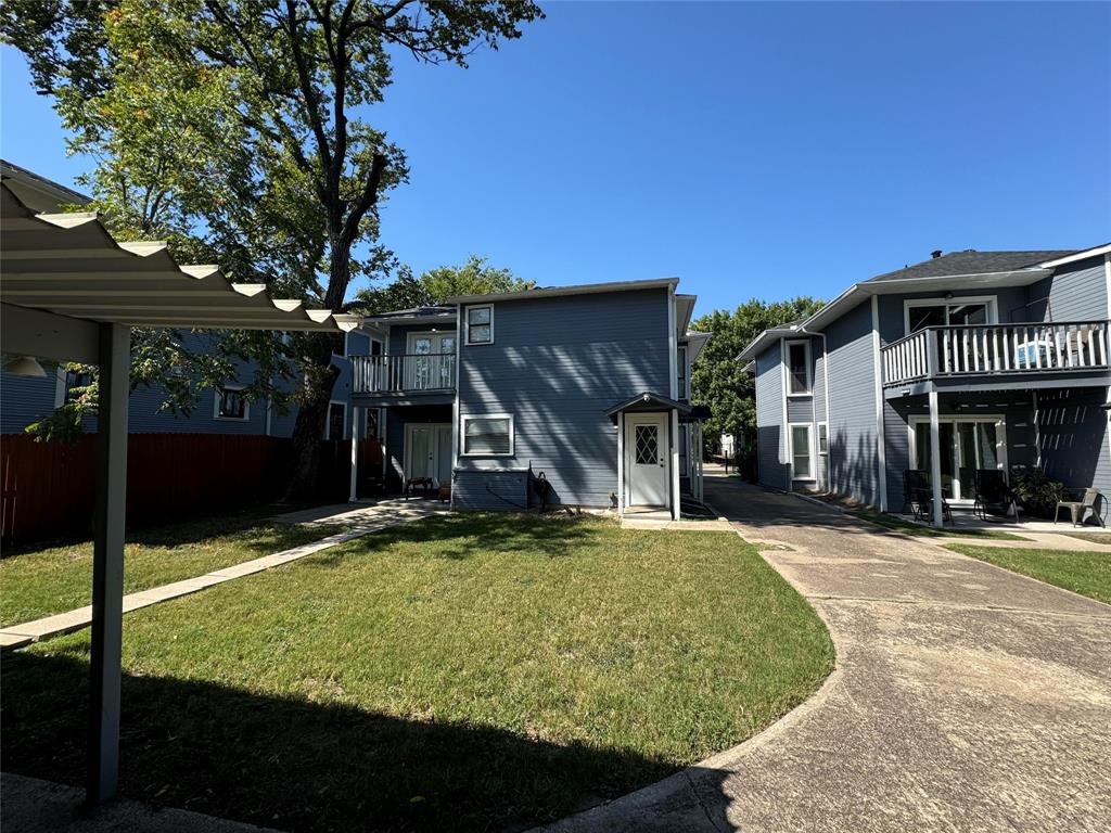 4512 Sycamore Street Dallas, TX 75204 - Photo 21 of 23 a view of a house with backyard