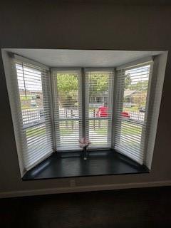 4512 Sycamore Street Dallas, TX 75204 - Photo 4 of 23 a view of empty room with wooden floor and fan