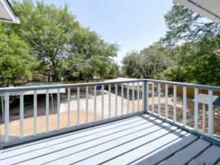 4512 Sycamore Street Dallas, TX 75204 - Photo 10 of 23 a view of balcony with wooden floor and fence
