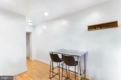 a view of a room with table and chair