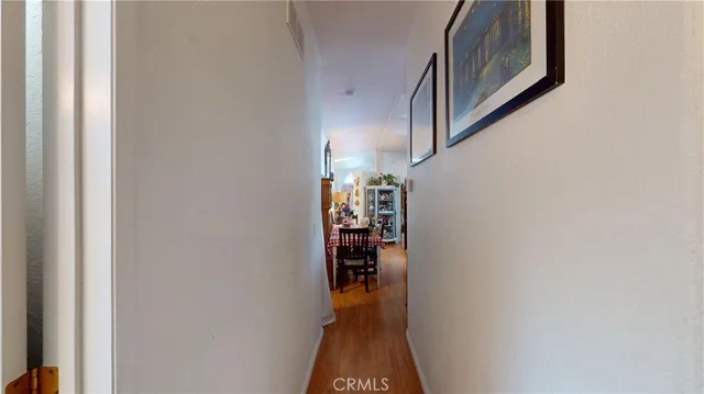 a view of a livingroom with furniture and workspace