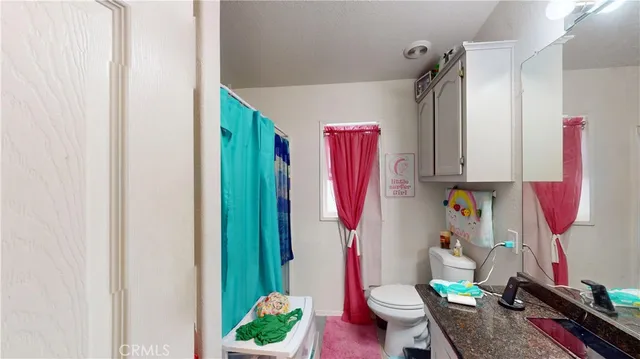 a living room filled with furniture