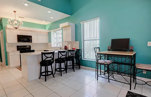 a view of a dining room with furniture