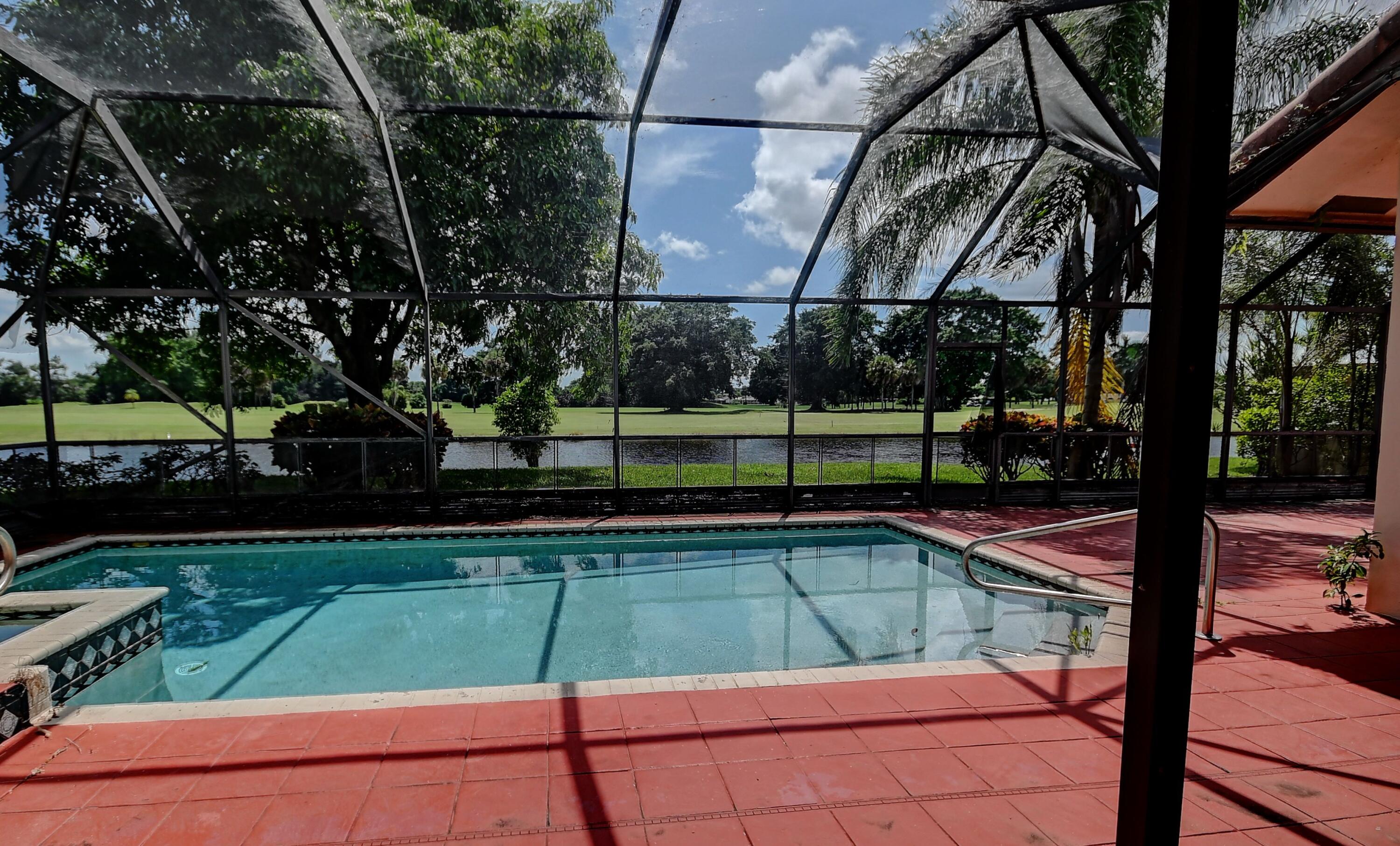 19356 Cherry Hills Terrace Boca Raton, FL 33498 - Photo 18 of 22 a view of a tennis court