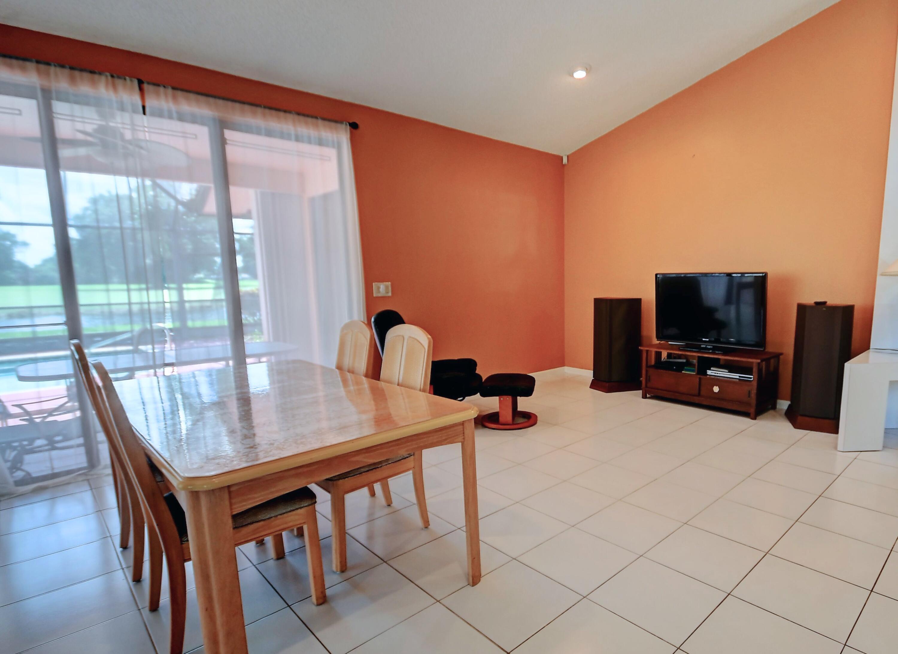19356 Cherry Hills Terrace Boca Raton, FL 33498 - Photo 5 of 22 a room with furniture and a flat screen tv
