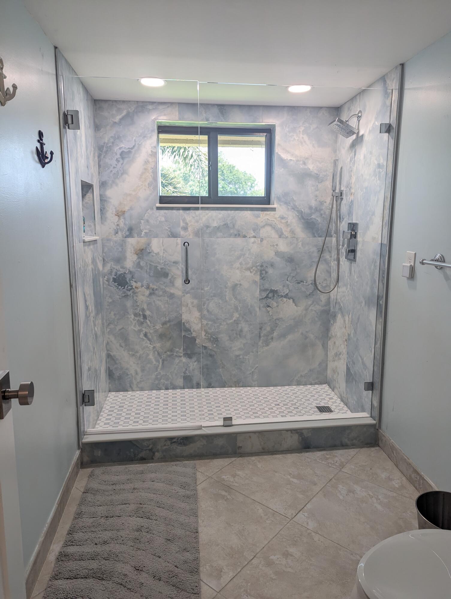 17081 Waterbend Drive, Unit 228 Jupiter, FL 33477 - Photo 14 of 21 a bathroom with a shower