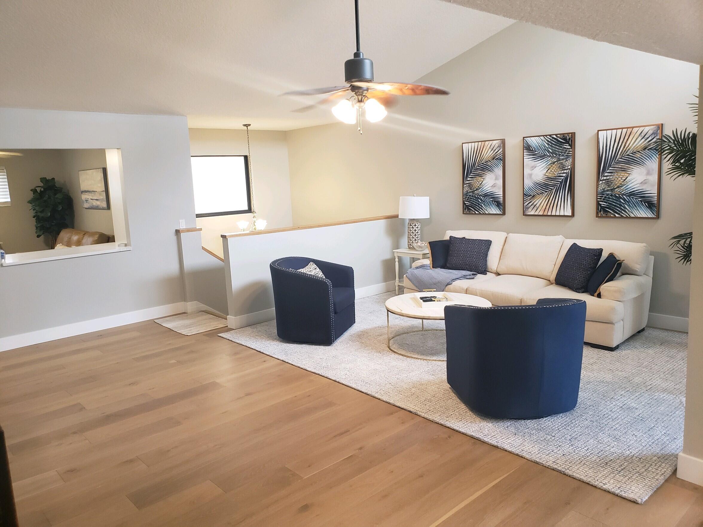 17081 Waterbend Drive, Unit 228 Jupiter, FL 33477 - Photo 4 of 21 a living room with furniture and a window