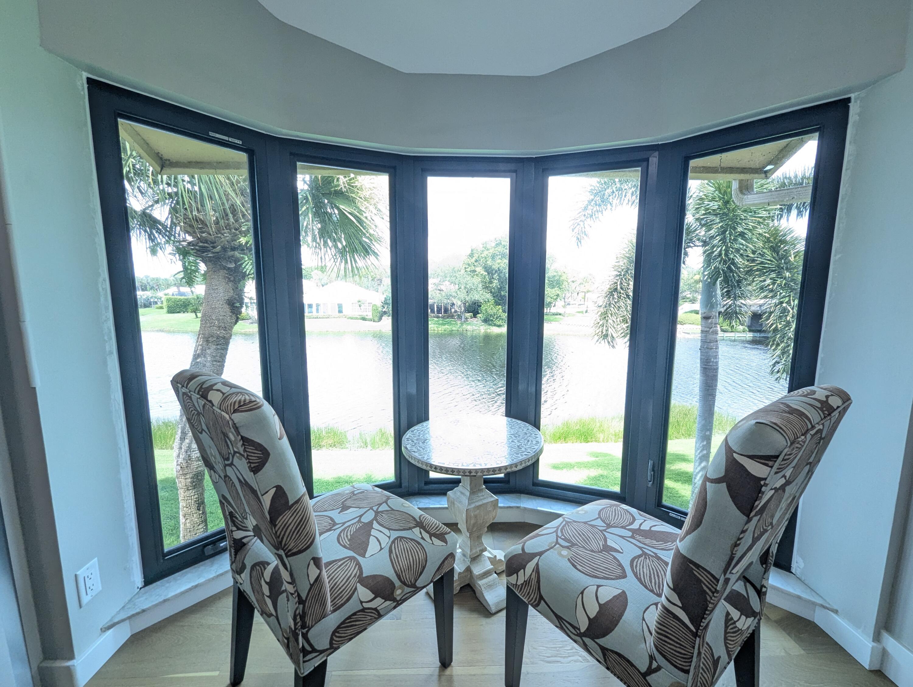 17081 Waterbend Drive, Unit 228 Jupiter, FL 33477 - Photo 9 of 21 a view of a dining room with furniture window and outside view
