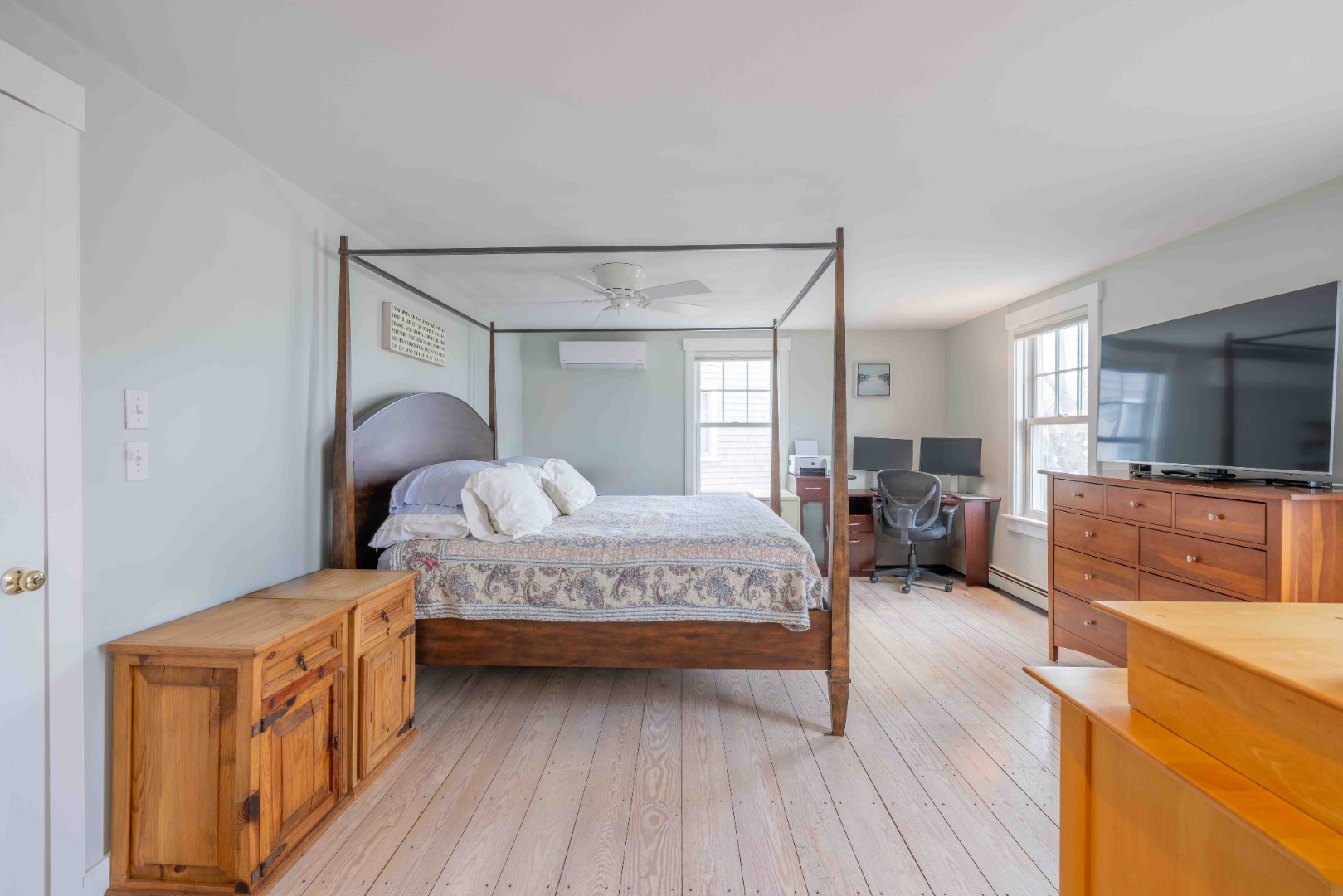 15 Goldfinch Drive Nantucket, MA 02554 - Photo 15 of 19 a bedroom with a bed and a flat screen tv