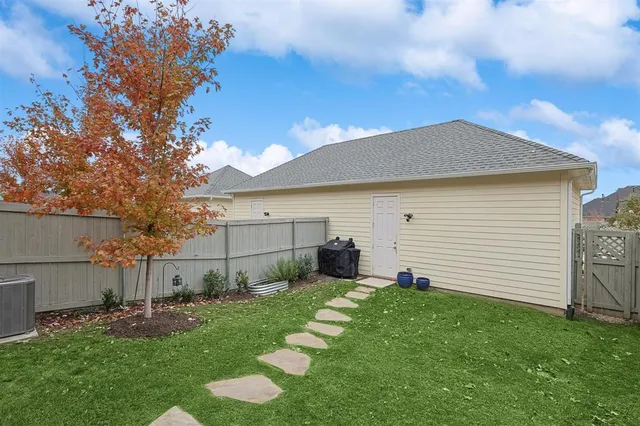 a view of house with outdoor space and street view