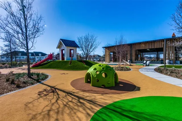 an aerial view of a house with a swimming pool yard and outdoor seating