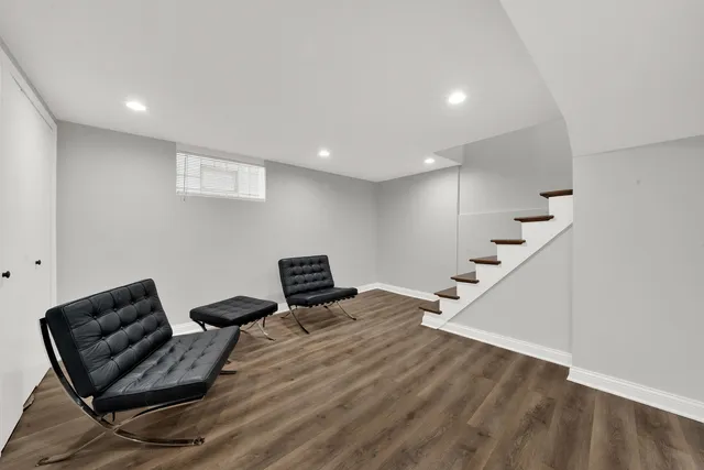 a room with furniture and stairs