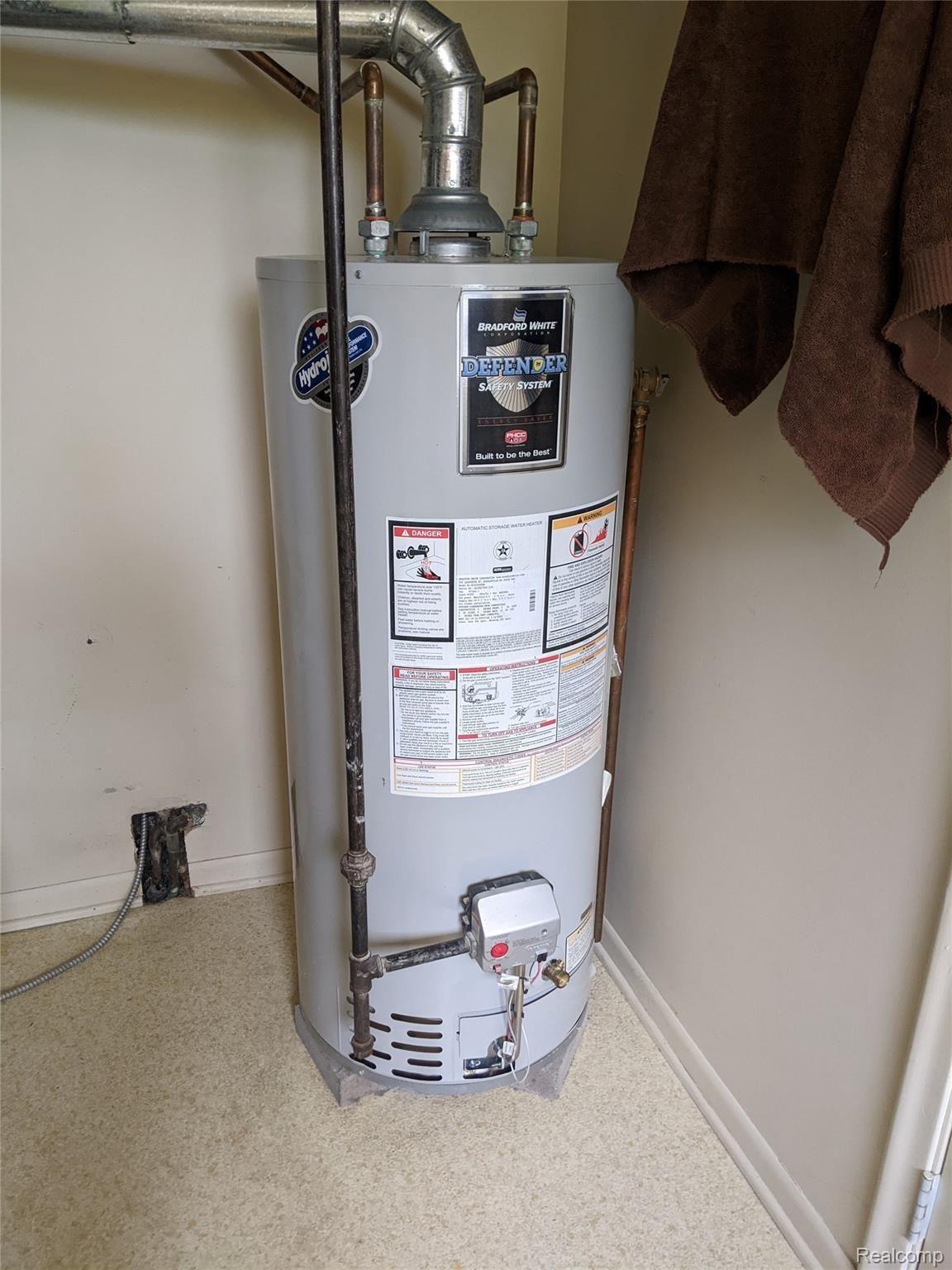 6221 Calkins Road Flint, MI 48532 - Photo 18 of 26 6221 Calkins Hot Water Tank.jpg