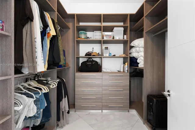 a utility room with sink dryer and washer