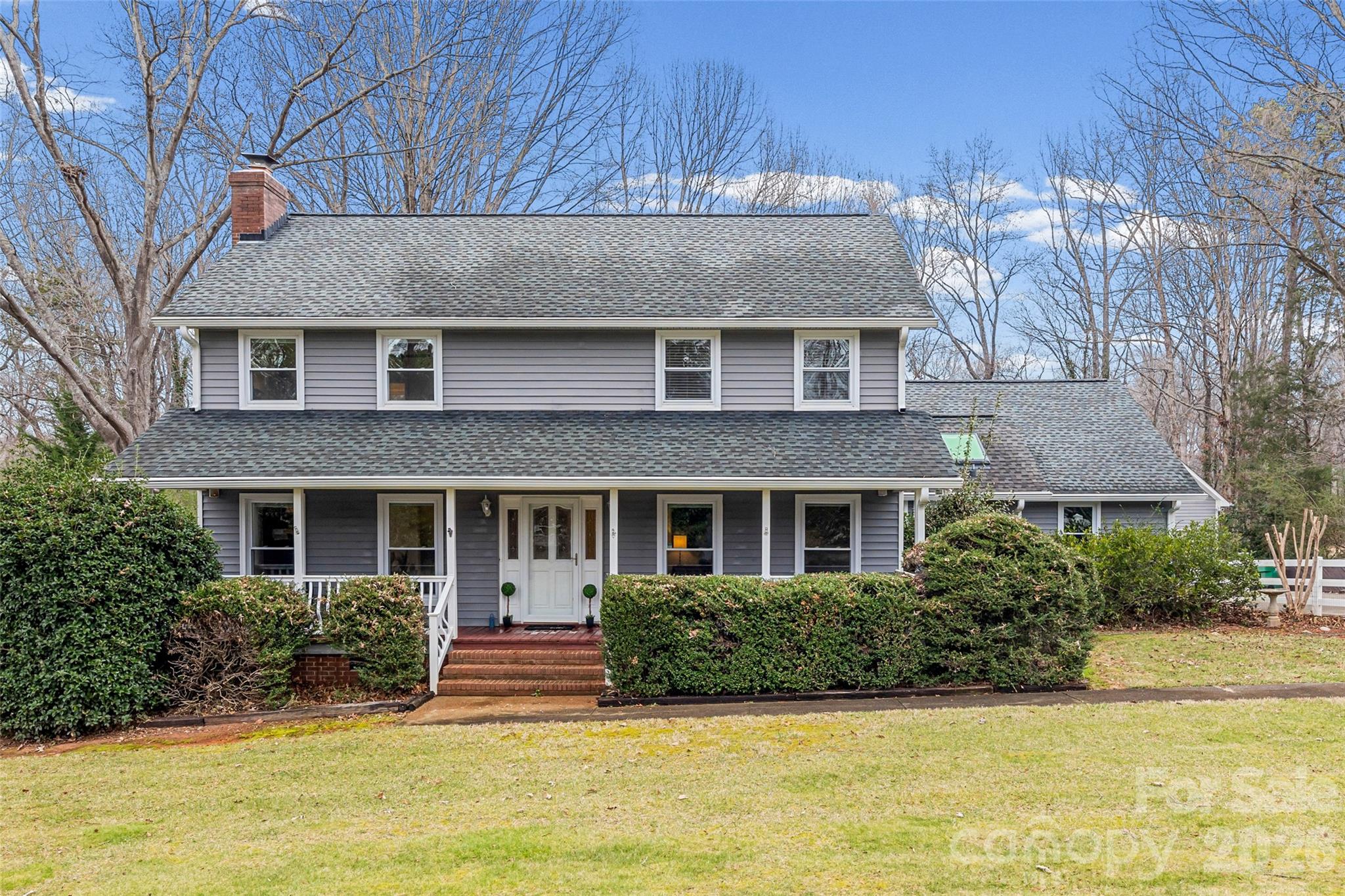 3320 Tilley Morris Road Matthews, NC 28105 - Photo 1 of 48 a front view of a house with a yard