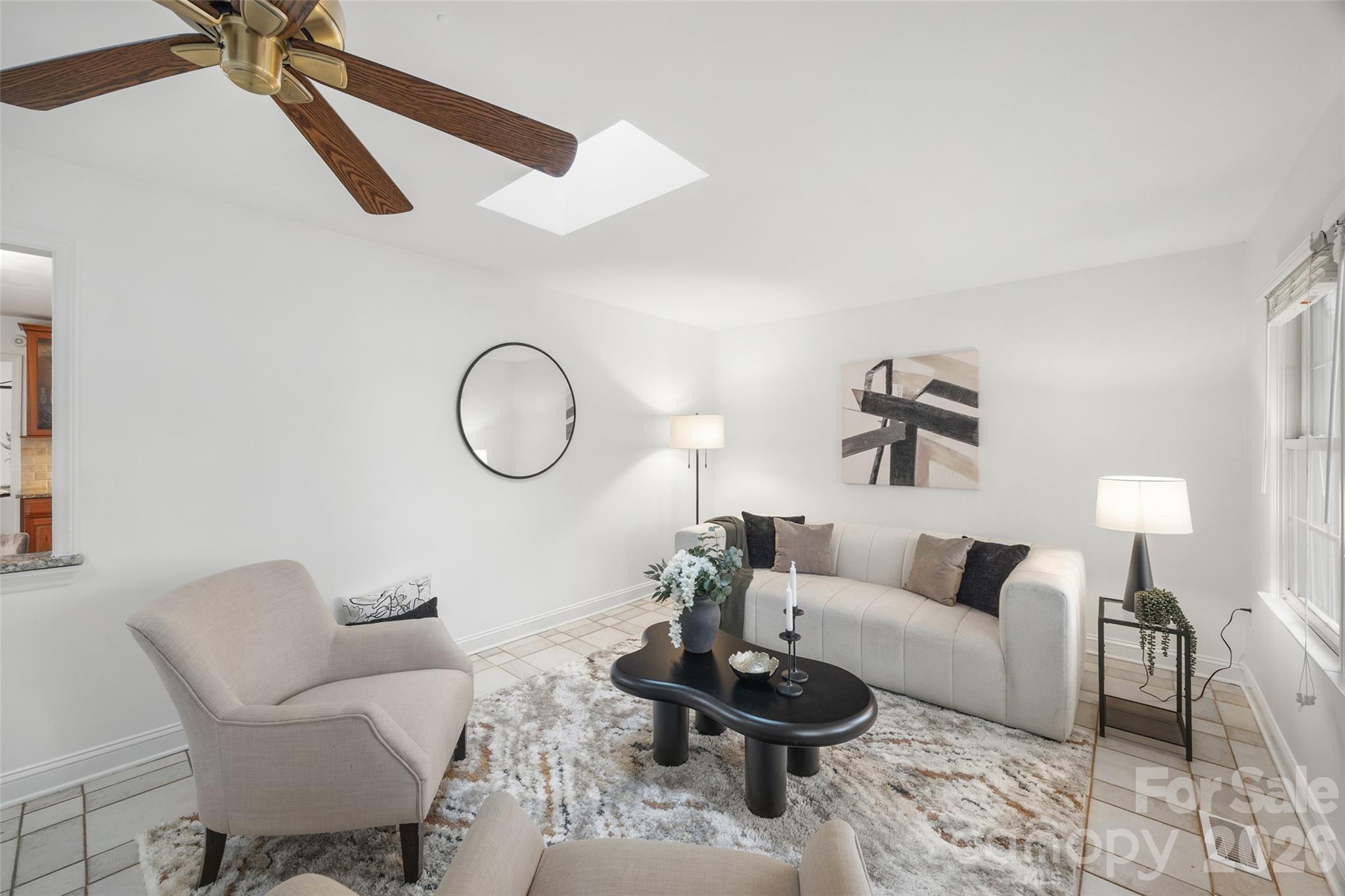 3320 Tilley Morris Road Matthews, NC 28105 - Photo 22 of 48 a living room with furniture and a wooden floor