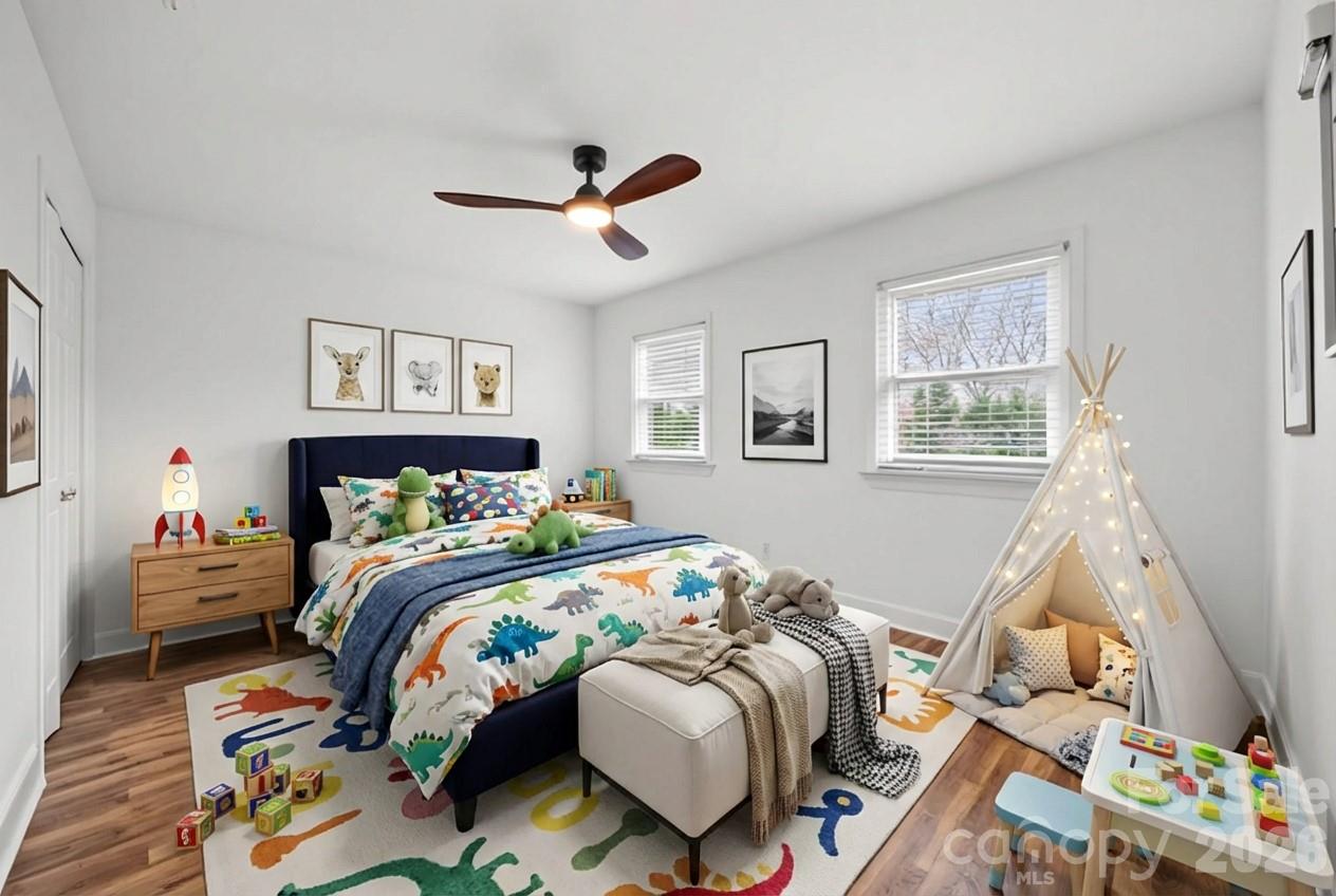 3320 Tilley Morris Road Matthews, NC 28105 - Photo 25 of 48 a bedroom with a bed and a window