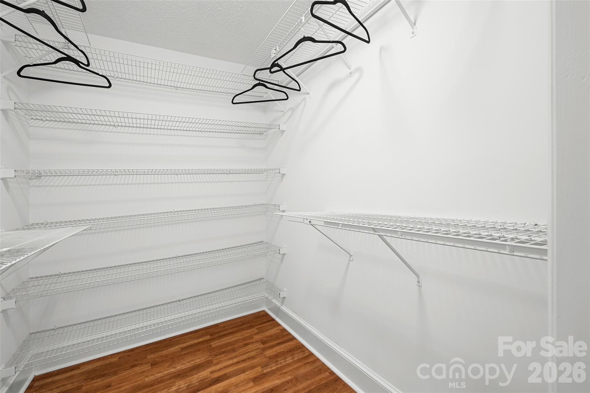 3320 Tilley Morris Road Matthews, NC 28105 - Photo 35 of 48 a view of a room with racks on the wall