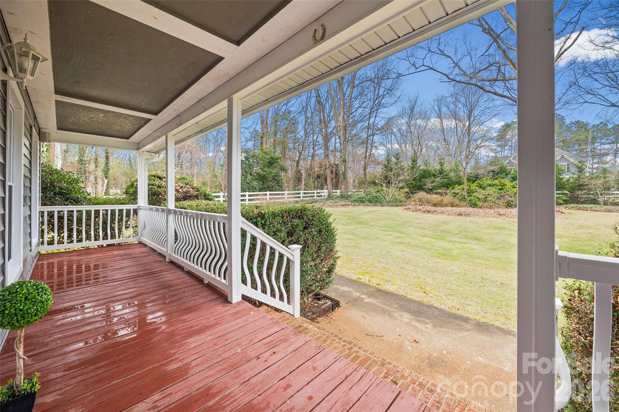 3320 Tilley Morris Road Matthews, NC 28105 - Photo 37 of 48 a view of a room with wooden floor and floor to ceiling window