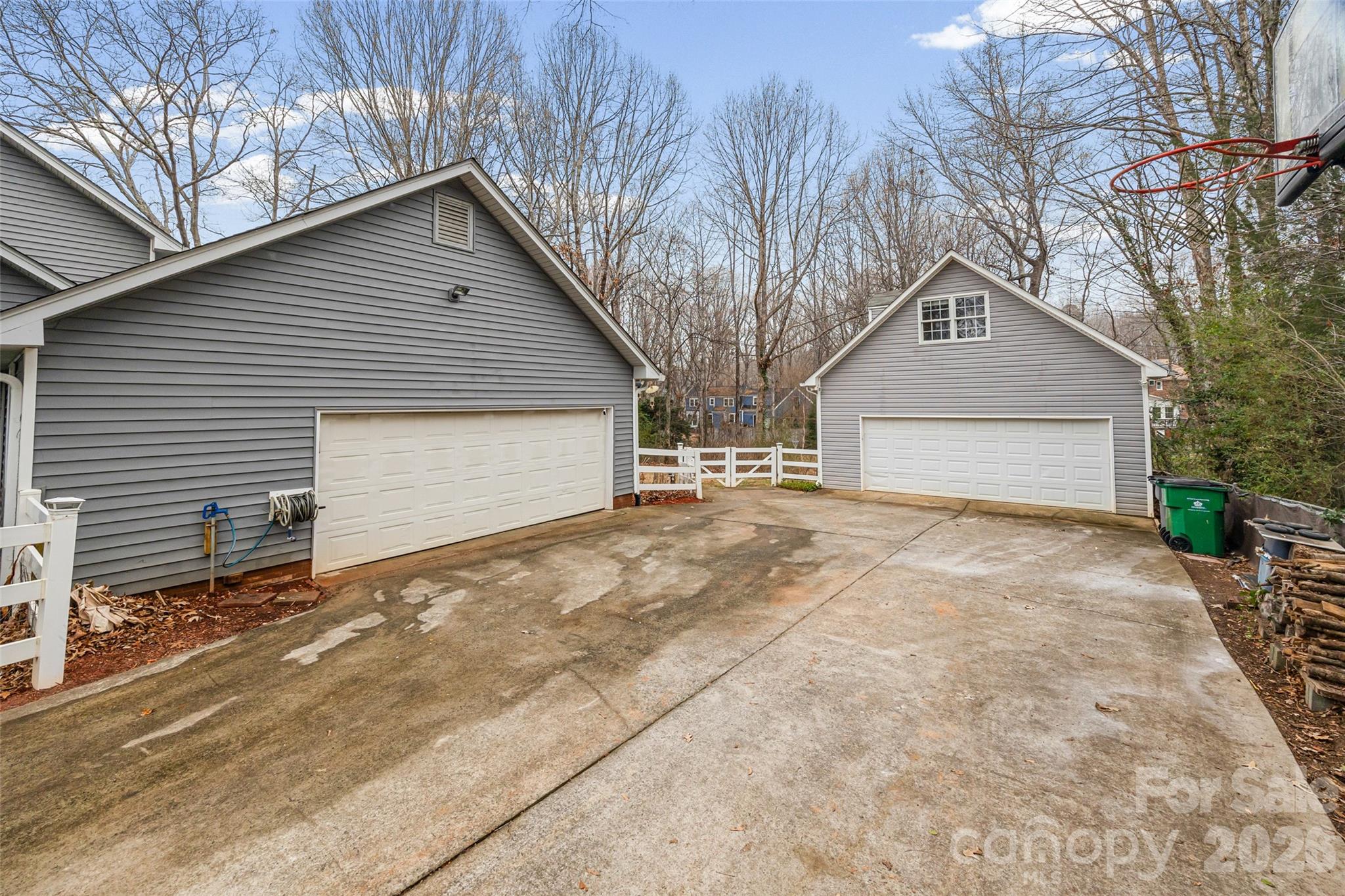 3320 Tilley Morris Road Matthews, NC 28105 - Photo 43 of 48 a view of a house with a yard and garage