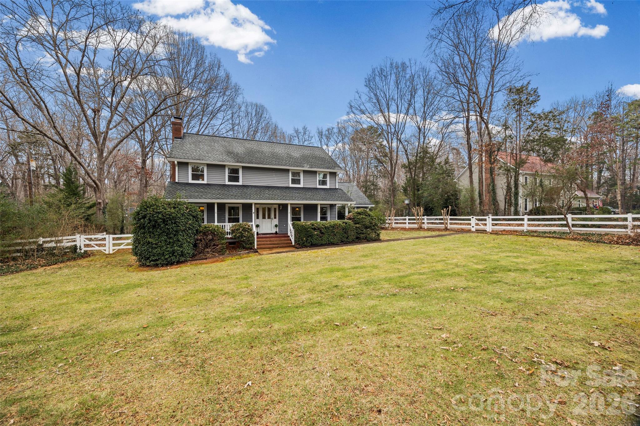 3320 Tilley Morris Road Matthews, NC 28105 - Photo 47 of 48 a front view of a house with a yard