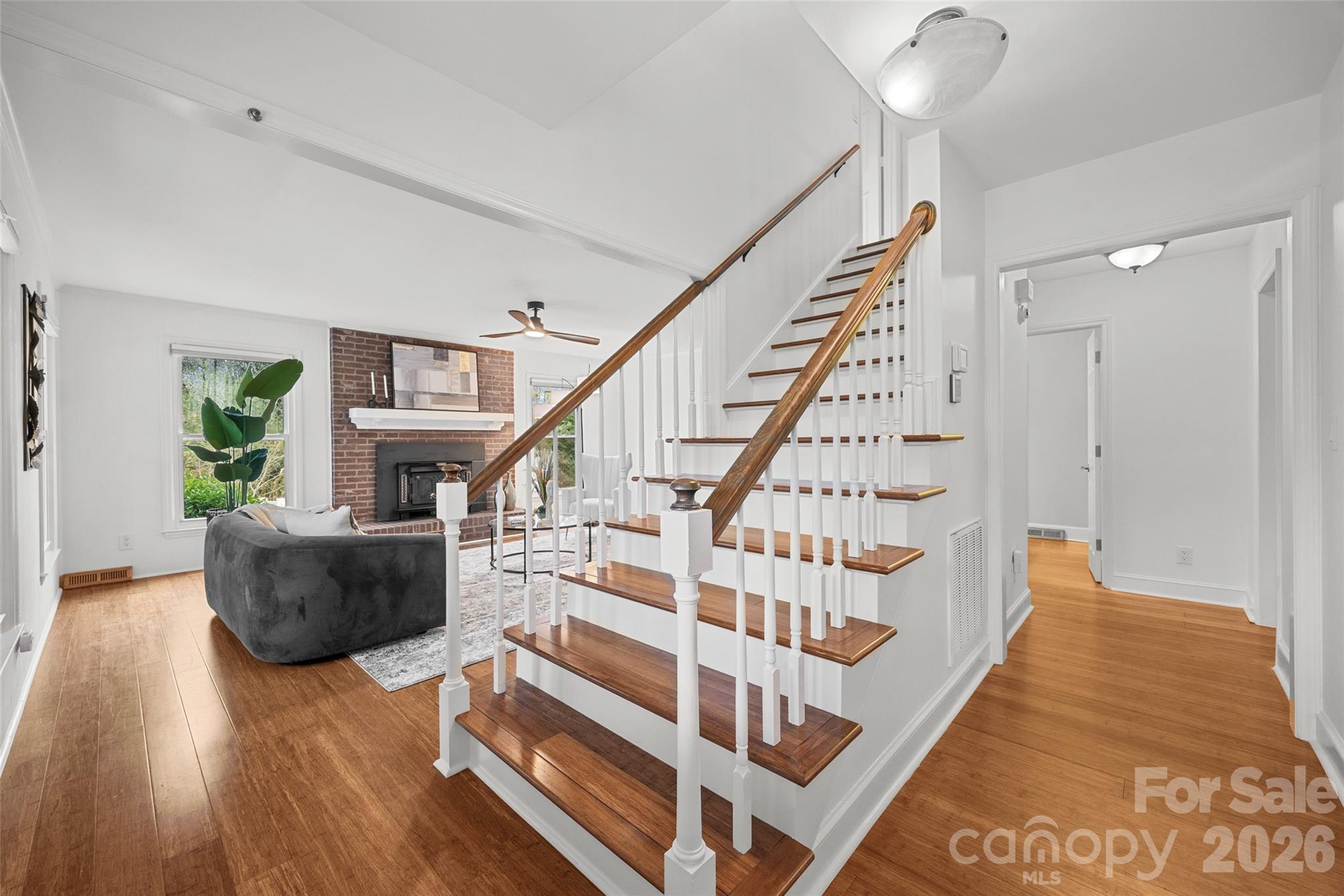 3320 Tilley Morris Road Matthews, NC 28105 - Photo 5 of 48 a view of entryway and hall with wooden floor