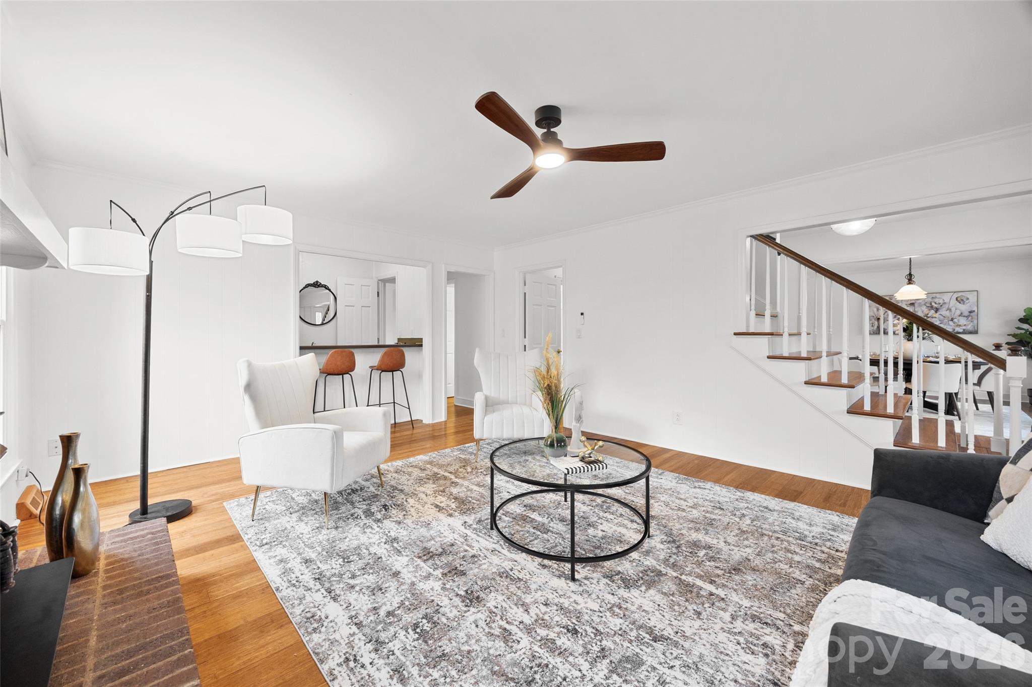 3320 Tilley Morris Road Matthews, NC 28105 - Photo 7 of 48 a living room with furniture and wooden floor