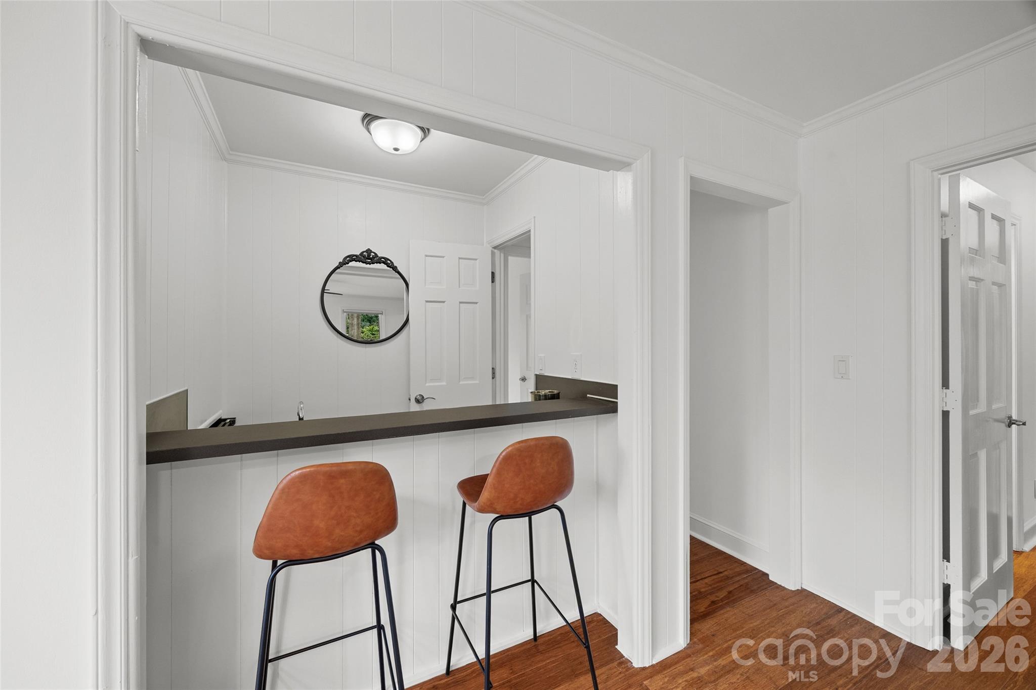 3320 Tilley Morris Road Matthews, NC 28105 - Photo 8 of 48 a balcony with table and chairs