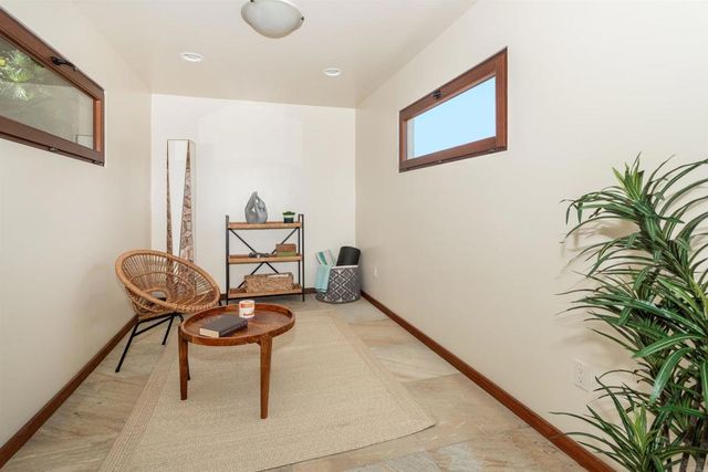 a kitchen with stainless steel appliances granite countertop a stove and a microwave