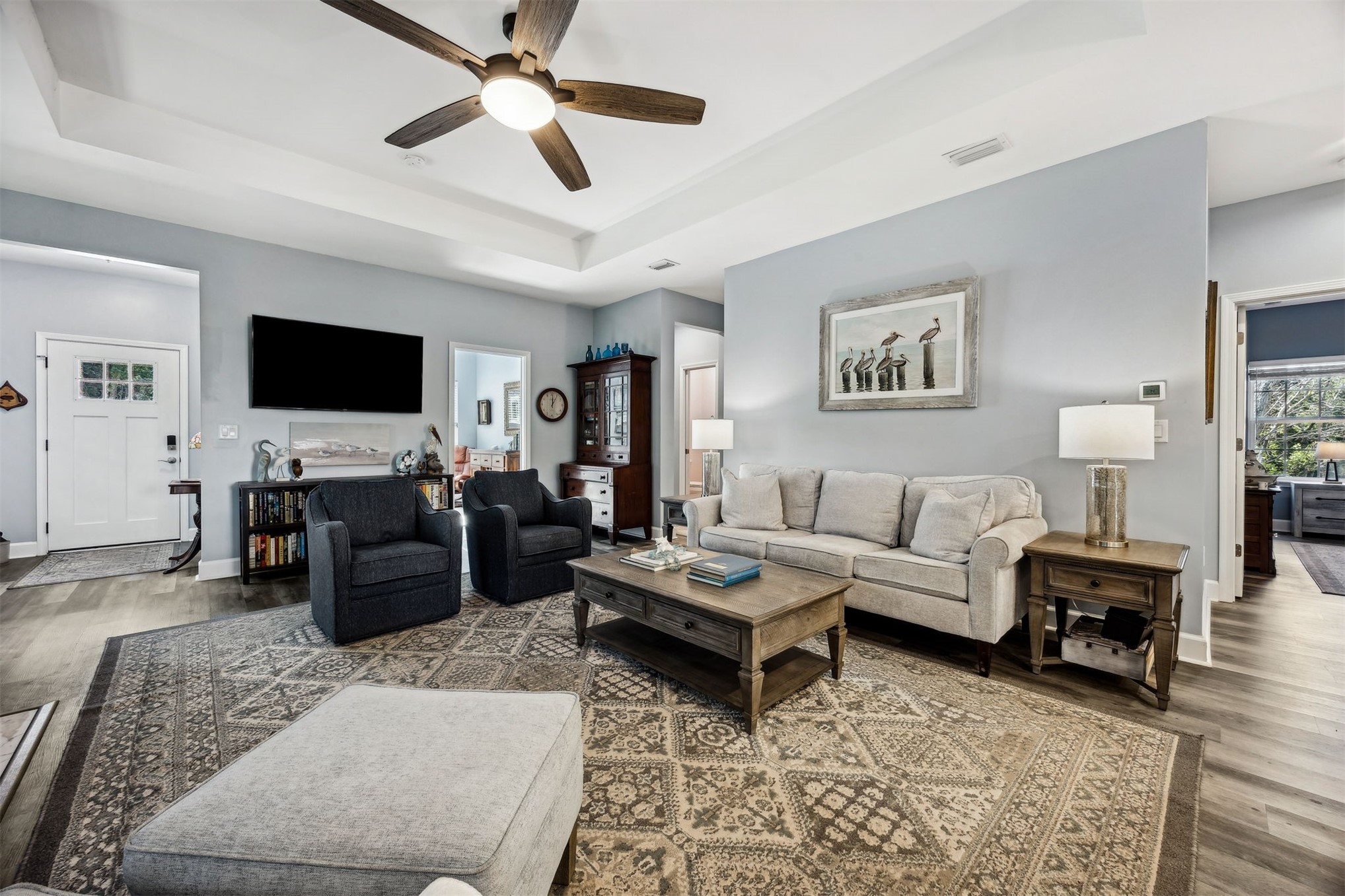 307 Elm Street Fernandina Beach, FL 32034 - Photo 14 of 35 a living room with furniture and a flat screen tv