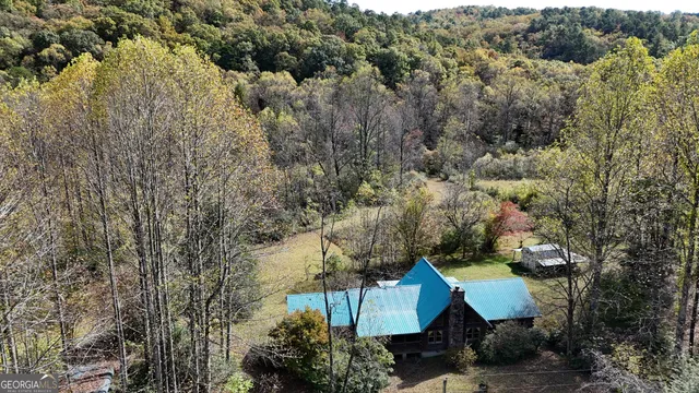 a view of outdoor space with wooden floor