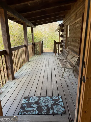 a kitchen with stainless steel appliances kitchen island granite countertop a refrigerator a stove and a sink