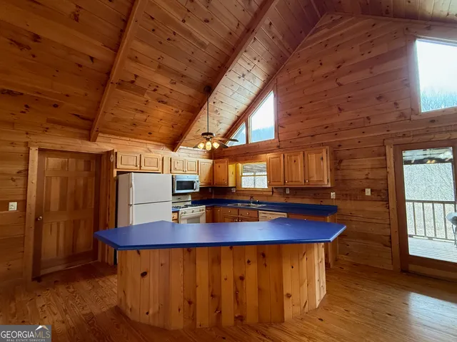 a backyard of a house with lots of green space