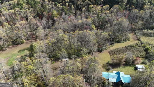 a house view with a backyard space