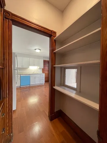 a room with a closet and a window