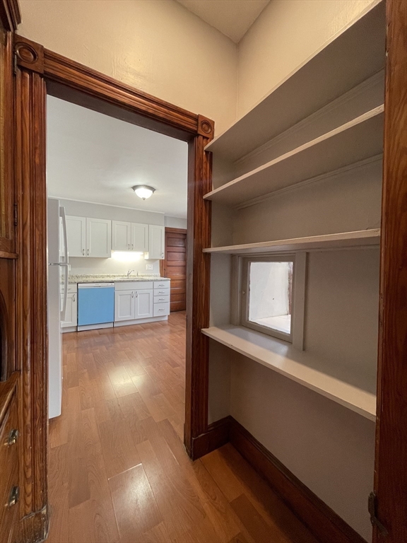 71 Mayfield Street, Unit 2 Boston, MA 02125 - Photo 13 of 33 a view of a room with wooden floor and a window
