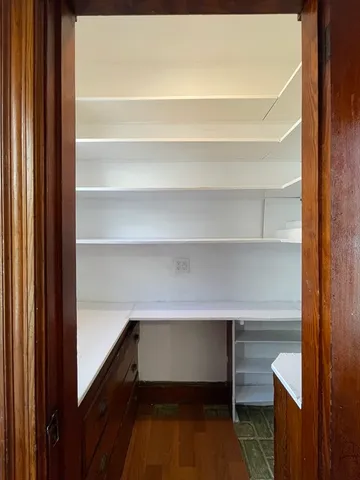 a kitchen with stainless steel appliances granite countertop a refrigerator a stove a sink and a microwave