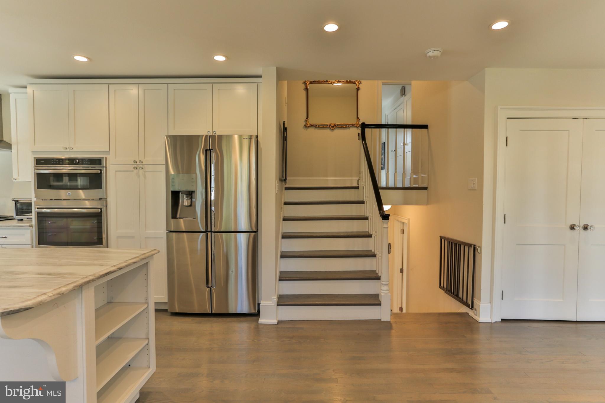 700 Panorama Road Villanova, PA 19085 - Photo 13 of 34 a view of kitchen with stainless steel appliances wooden floor and staircase