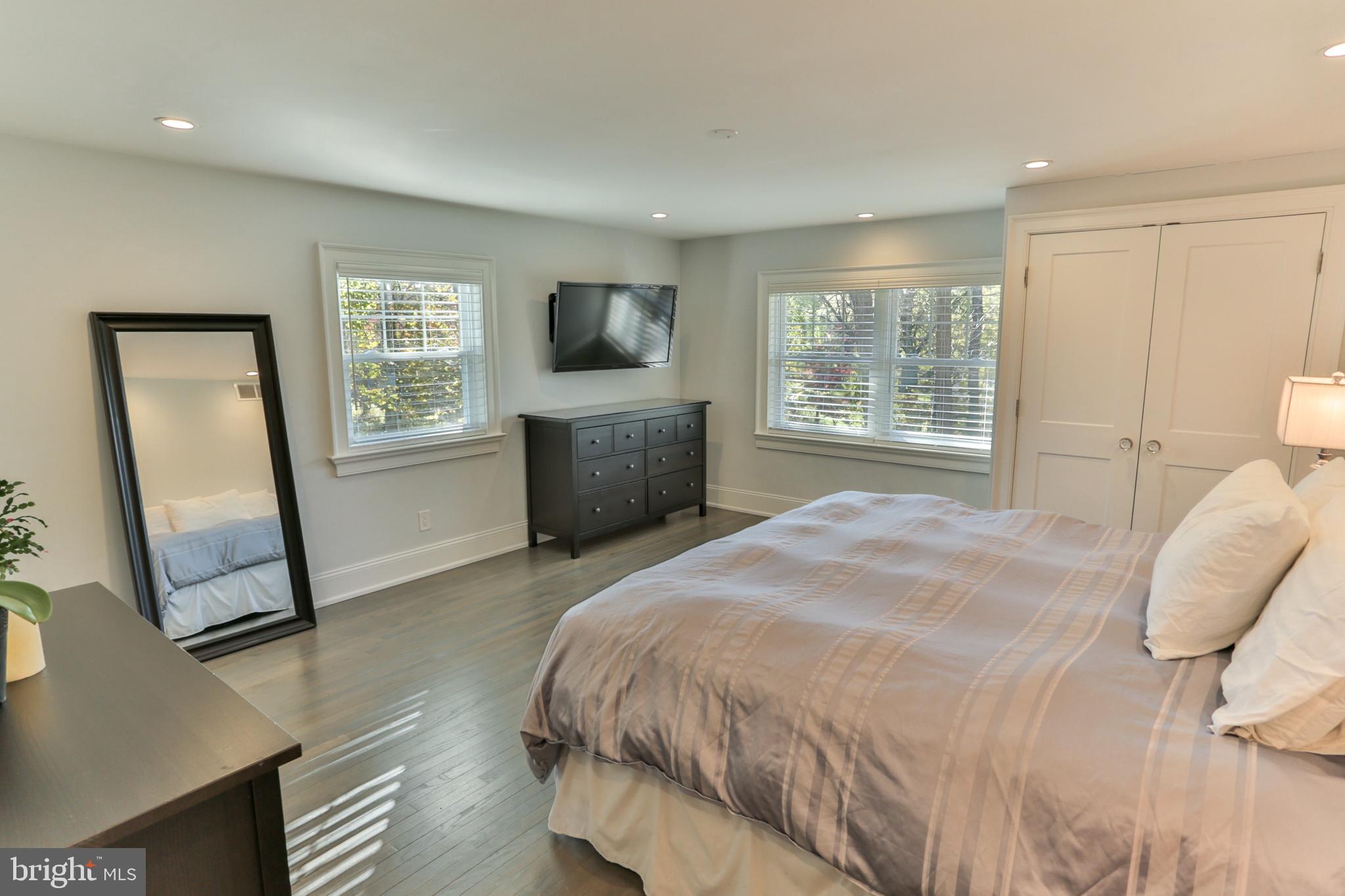 700 Panorama Road Villanova, PA 19085 - Photo 14 of 34 a bed sitting in a spacious bedroom next to a window